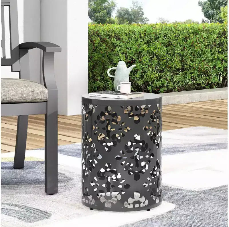 Table d'appoint cylindrique en métal au fini noir