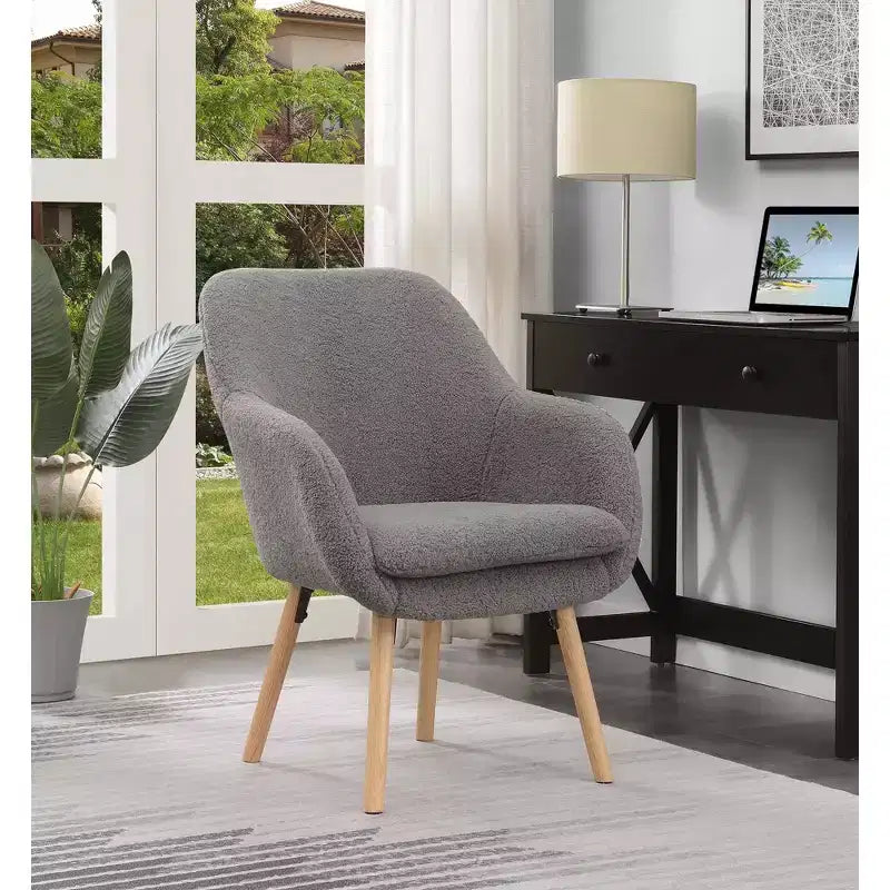 Fauteuil d'appoint à dossier haut en imitation peau de mouton